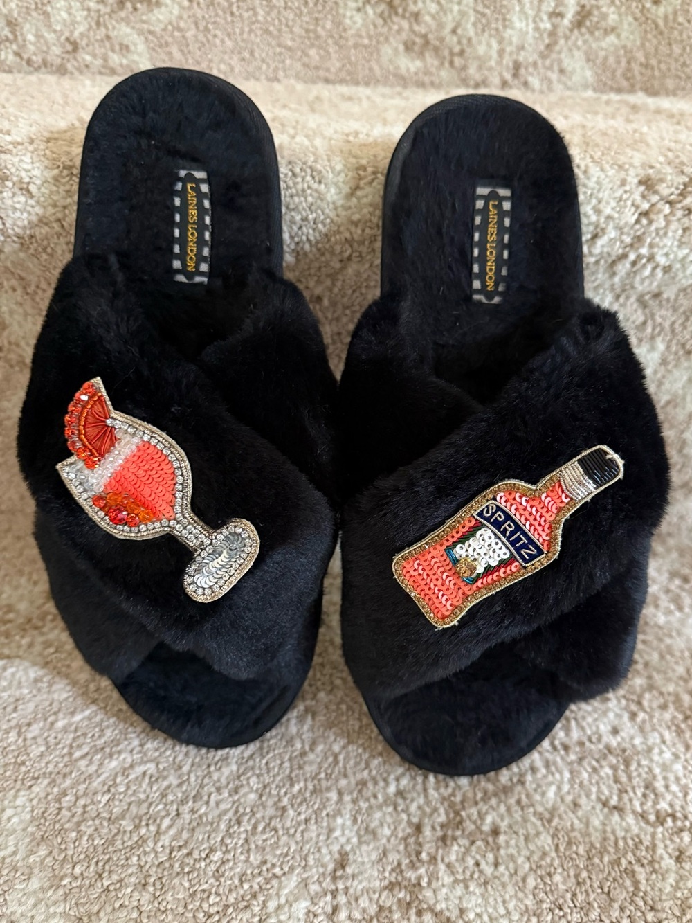 Laine’s London Black Faux Fur Slide Slippers with Aperol and spritz attachments